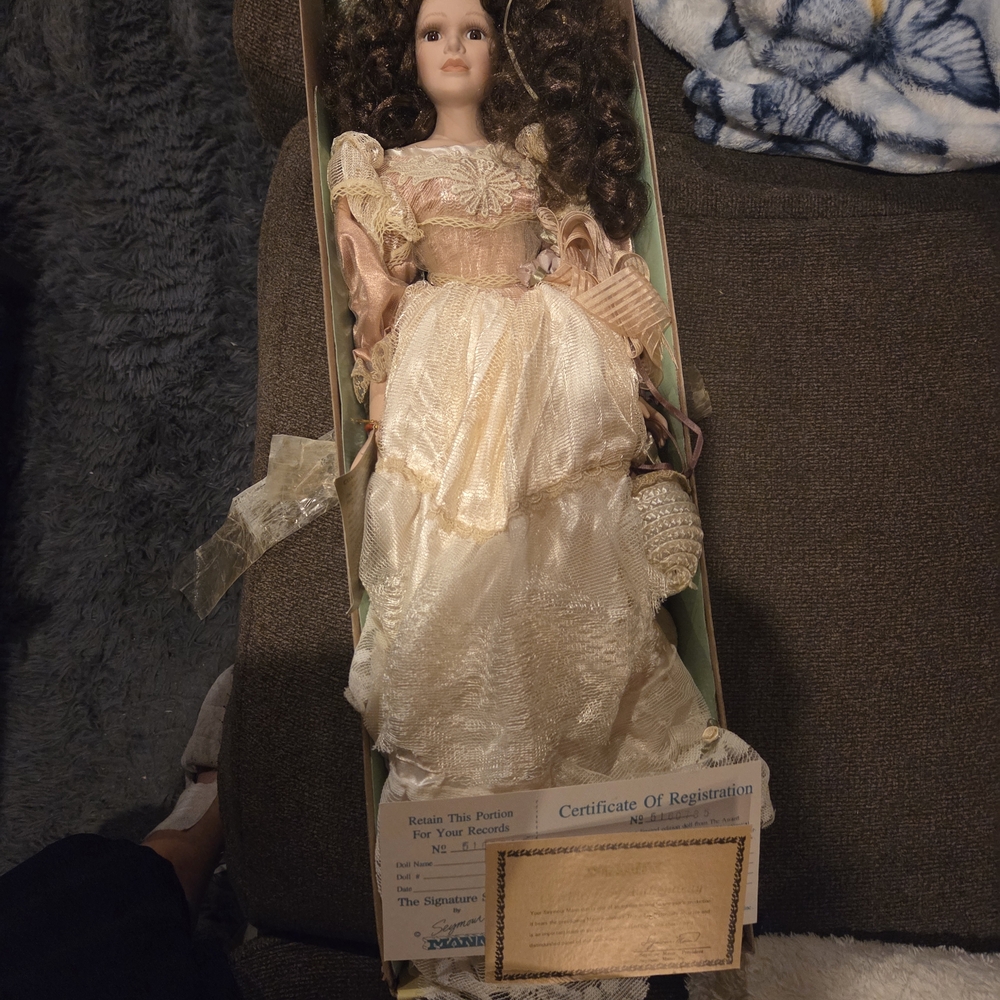 Elegant Cream Porcelain Doll